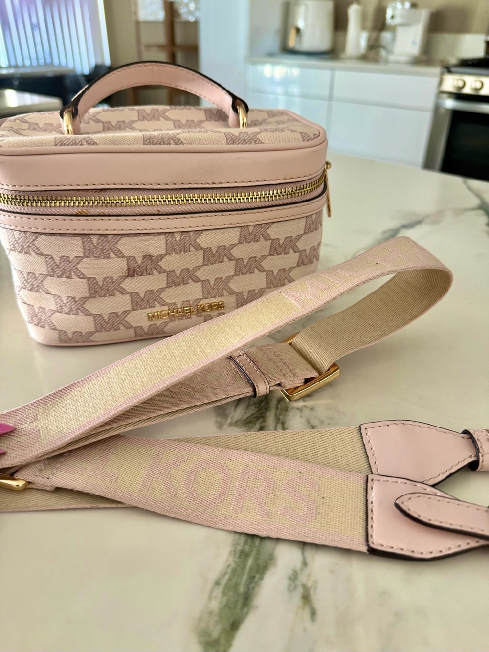 Michael Kors Light Pink Logo Vanity cosmetic bag with adjustable strap